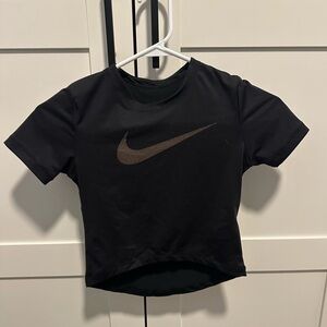 Spandex, form fitting Nike swoosh crop top